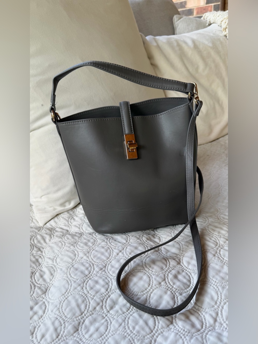 H&M gray bucket bag. Like new with one minor crease from storage.